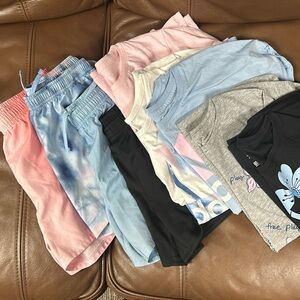 Girls Adidas shirts (5) and shorts (4) size 14 (large)
